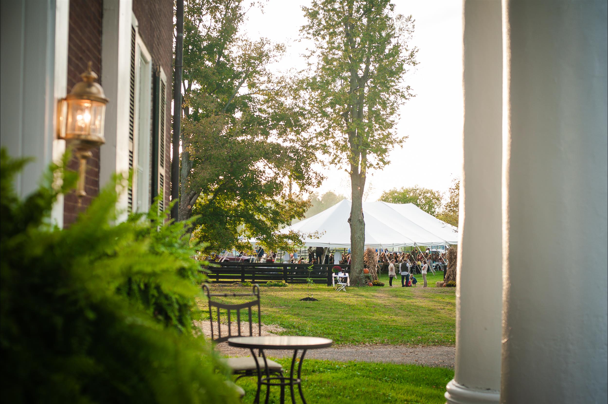 view from front porch of event tent on fall day